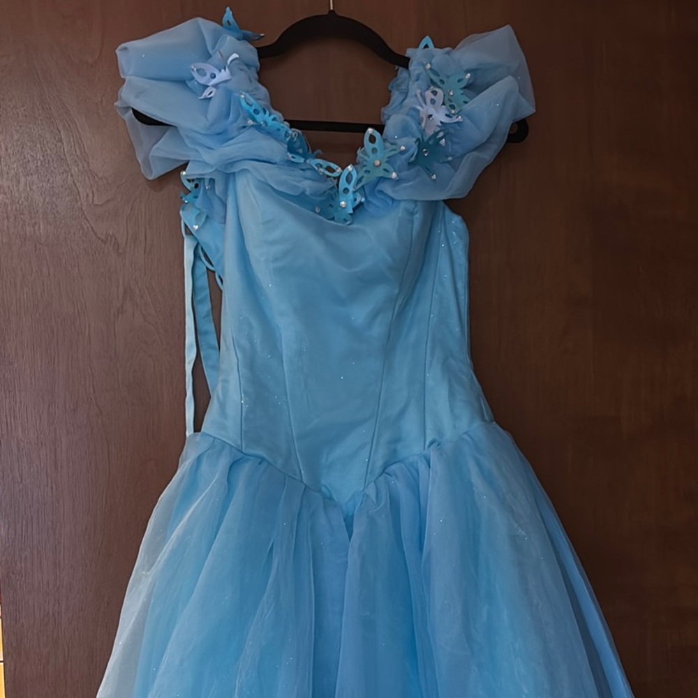 Elegant Blue Gown with Floral Accents